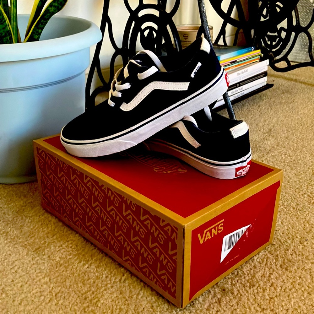 New Vans size 4.5. Never been worn!